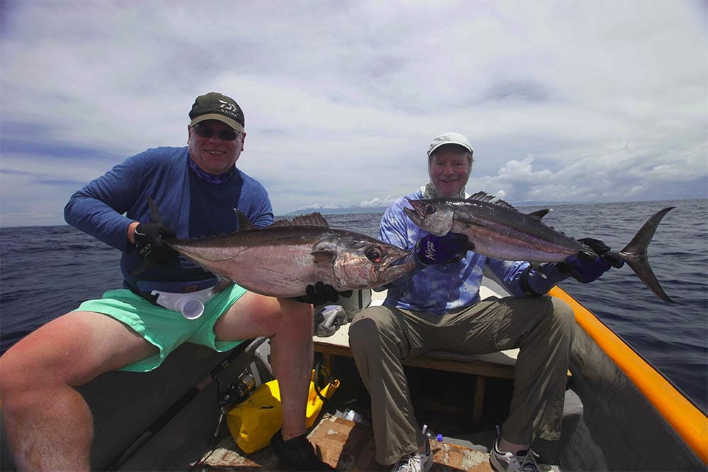 double dogtooth tuna catch charter sportfishing png papua new guinea
